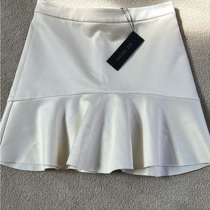 Rachel Zoe - never worn with tag still on, ivory colored.